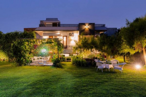 StayVista at The Magnolia Farm with Indoor Pool & Jacuzzi